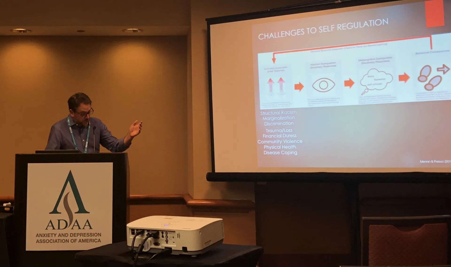 Dr. Mennin presenting at symposium